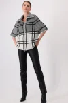 check-knit-cape-UMXjJLPR-0.webp